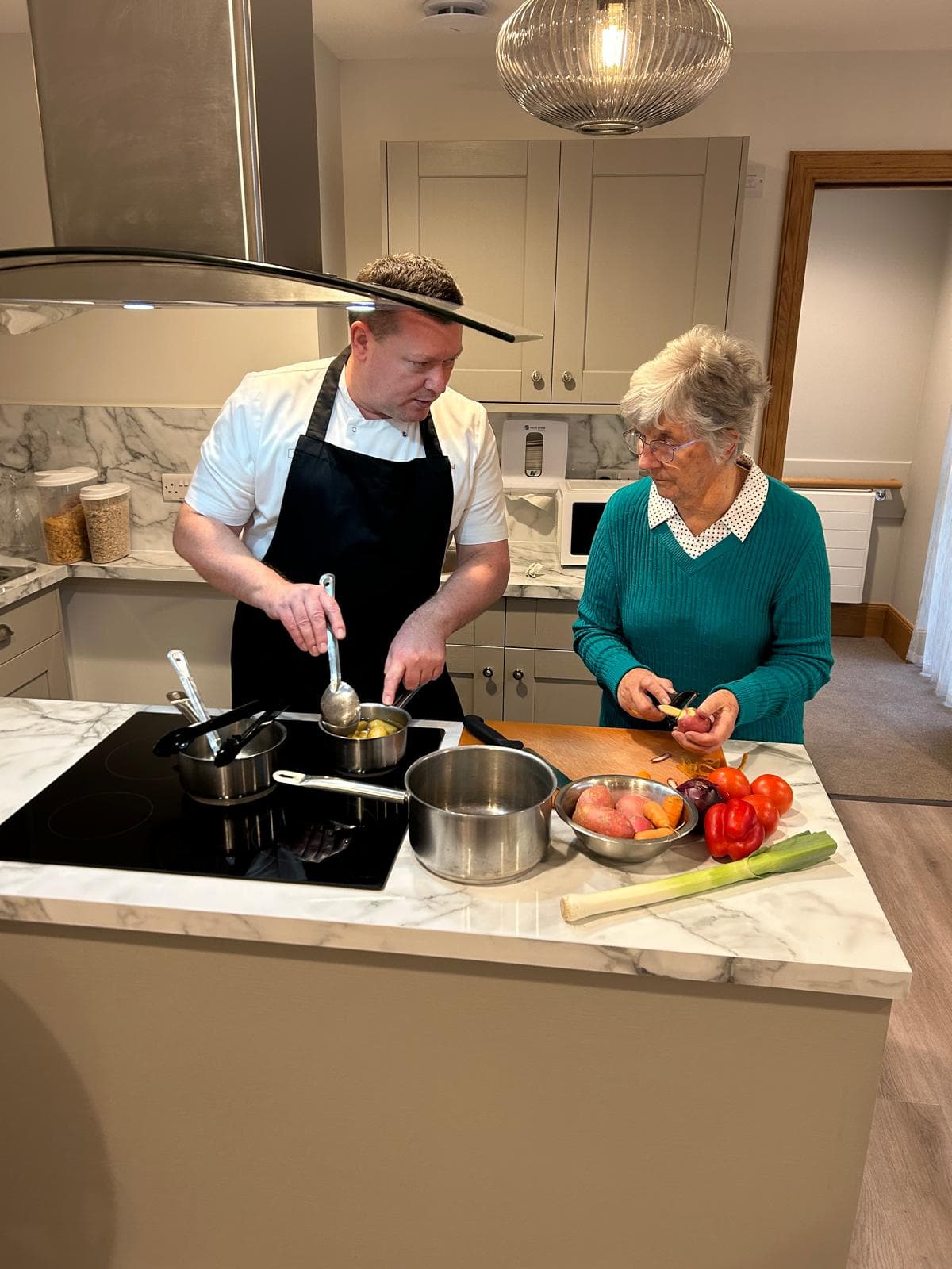 Glamis dining room with fully equipped kitchen at Woodlands Care Home in Aberdeen